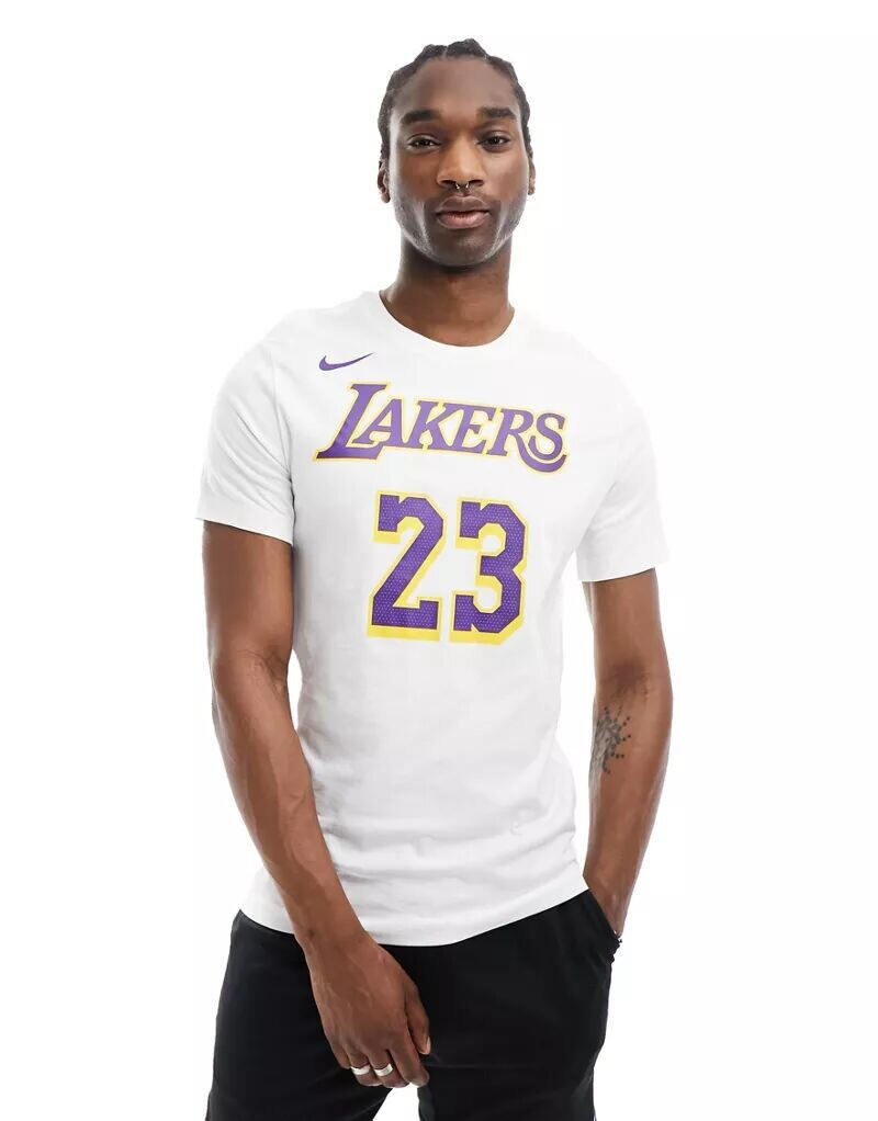 Бело-фиолетовая майка из джерси с логотипом Nike NBA LA Lakers Dri-FIT LeBron James
Бело-фиолетовая майка из джерси с логотипом Nike NBA LA Lakers Dri-FIT LeBron James