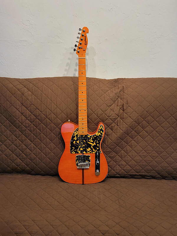 Электрогитара Eastwood Artist Series Mad Cat Flame Maple Top Ash Body Maple Neck C Shape 6-String Electric Guitar
Электрогитара Eastwood Artist Series Mad Cat Flame Maple Top Ash Body Maple Neck C Shape 6-String Electric Guitar