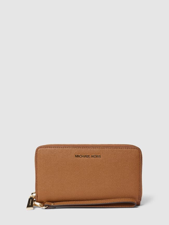 Кошелек с аппликацией этикетки, модель "JET SET" MICHAEL Michael Kors, коньячный цвет
Кошелек с аппликацией этикетки, модель "JET SET" MICHAEL Michael Kors, коньячный цвет