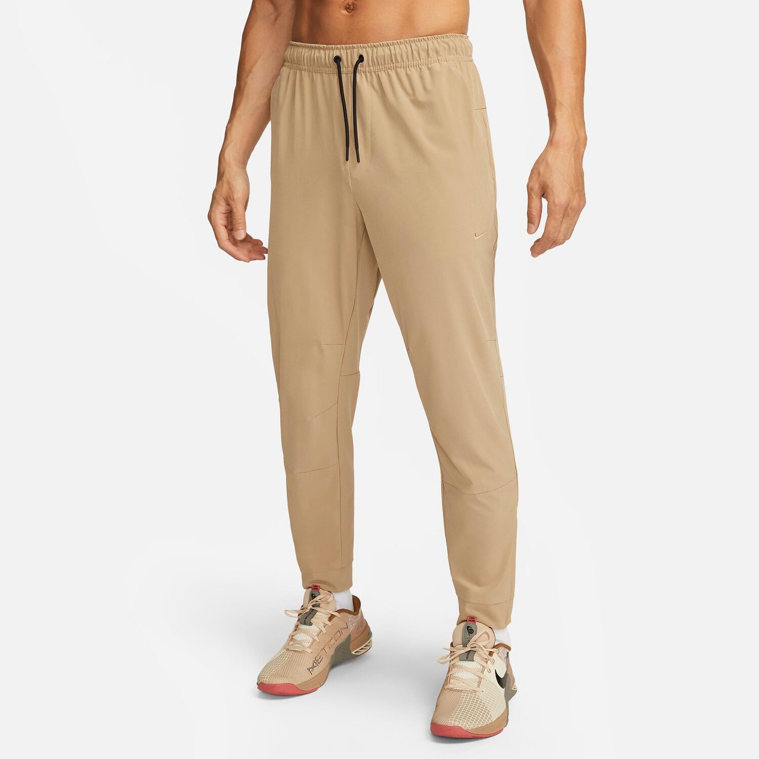 Мужские универсальные тренировочные брюки с зауженной кромкой Nike Dri-FIT Unlimited, бежевый
Мужские универсальные тренировочные брюки с зауженной кромкой Nike Dri-FIT Unlimited, бежевый