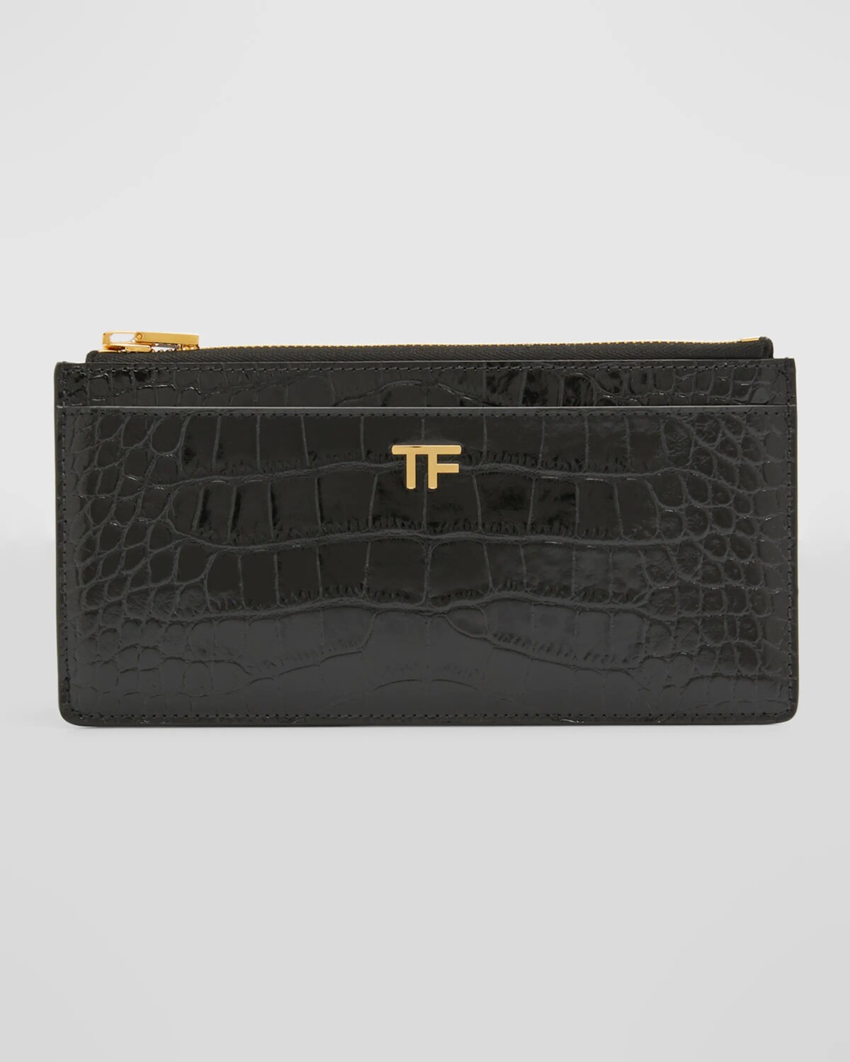 Многофункциональный кошелек TF из тисненой кожи под крокодила TOM FORD, цвет Black
Многофункциональный кошелек TF из тисненой кожи под крокодила TOM FORD, цвет Black