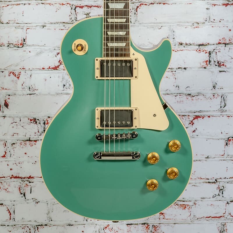 Электрогитара Gibson - Les Paul Standard 50s Plain Top - Electric Guitar - Inverness Green - w/Hardshell Case - x0193
Электрогитара Gibson - Les Paul Standard 50s Plain Top - Electric Guitar - Inverness Green - w/Hardshell Case - x0193