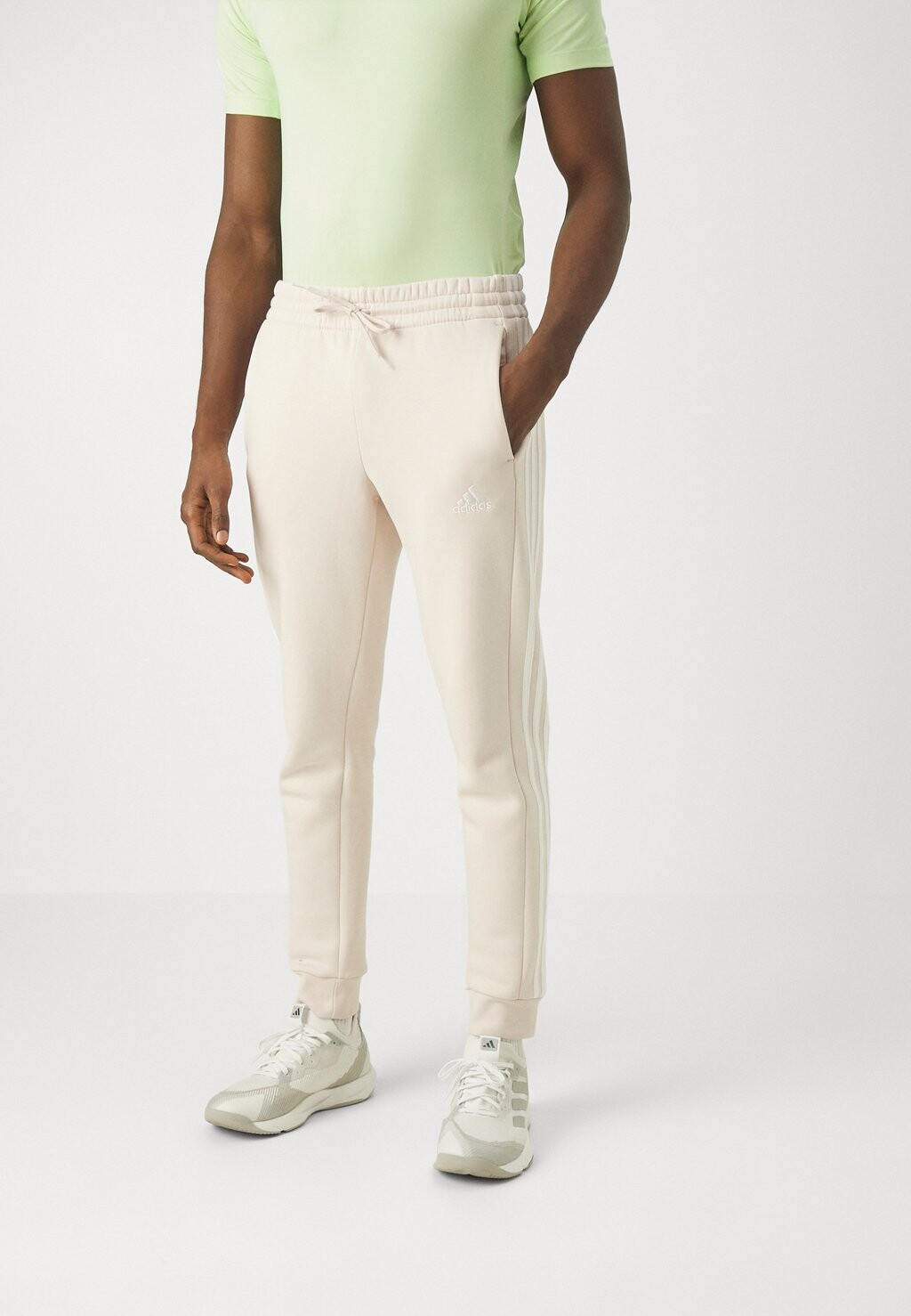 Спортивные брюки Essentials Tapered Cuff Pants adidas Sportswear, цвет putty mauve
Спортивные брюки Essentials Tapered Cuff Pants adidas Sportswear, цвет putty mauve
