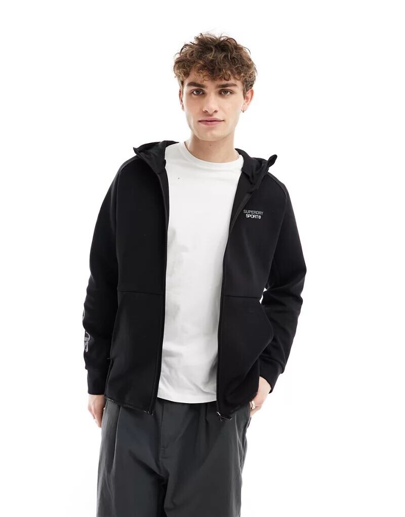 Черная техническая куртка свободного кроя с капюшоном и логотипом Superdry Sport
Черная техническая куртка свободного кроя с капюшоном и логотипом Superdry Sport