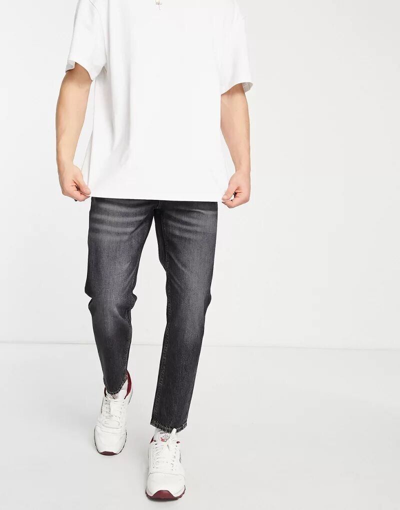 Черные джинсы из жесткого классического денима ASOS Cone Mill American Classic
Черные джинсы из жесткого классического денима ASOS Cone Mill American Classic