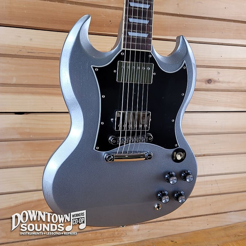 Электрогитара Gibson SG Standard Electric Guitar with Gibson Soft Shell Case - Silver Mist
Электрогитара Gibson SG Standard Electric Guitar with Gibson Soft Shell Case - Silver Mist