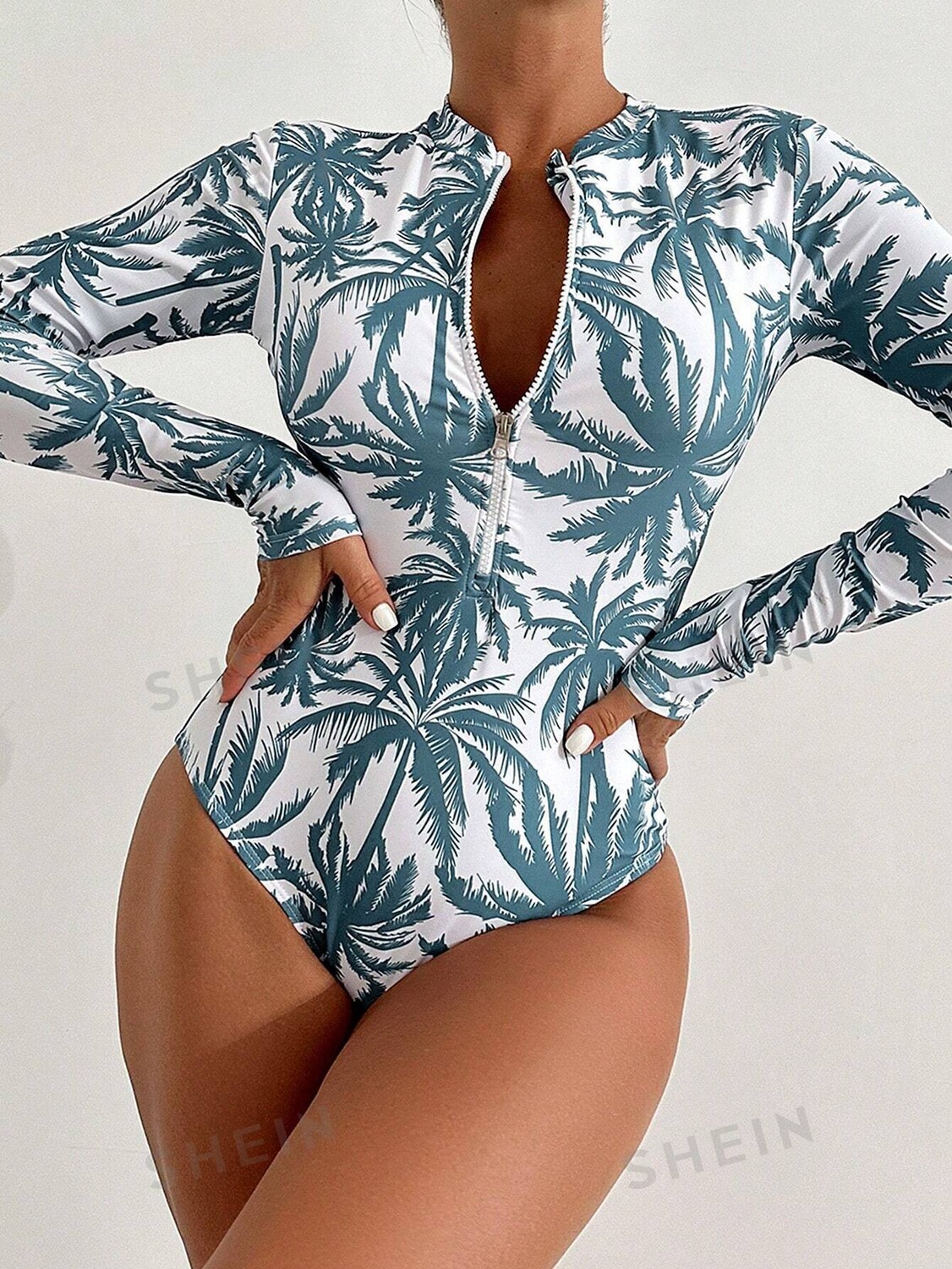 SHEIN Swim Vcay Женский цельный купальник с полумолнией спереди и длинными рукавами, пыльный синий
SHEIN Swim Vcay Женский цельный купальник с полумолнией спереди и длинными рукавами, пыльный синий
