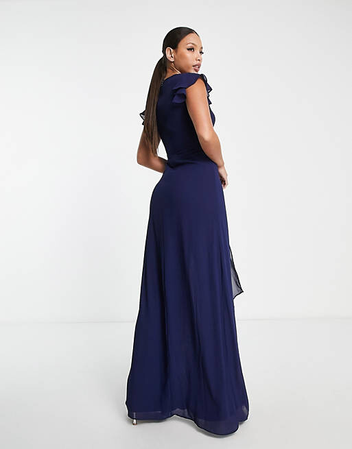 Темно-синее платье макси с оборками и развевающимися рукавами TFNC Tall Bridesmaid, Синий
Темно-синее платье макси с оборками и развевающимися рукавами TFNC Tall Bridesmaid, Синий