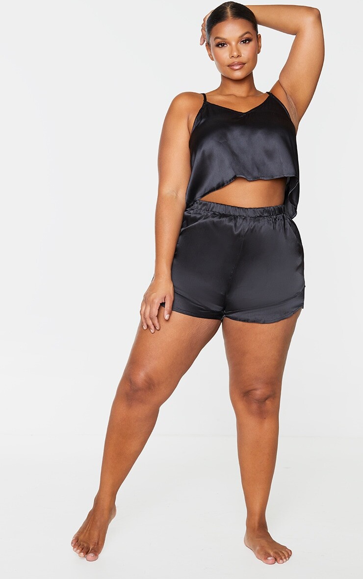 PrettyLittleThing Короткая пижама на бретельках Plus черного цвета с атласной оборкой
PrettyLittleThing Короткая пижама на бретельках Plus черного цвета с атласной оборкой