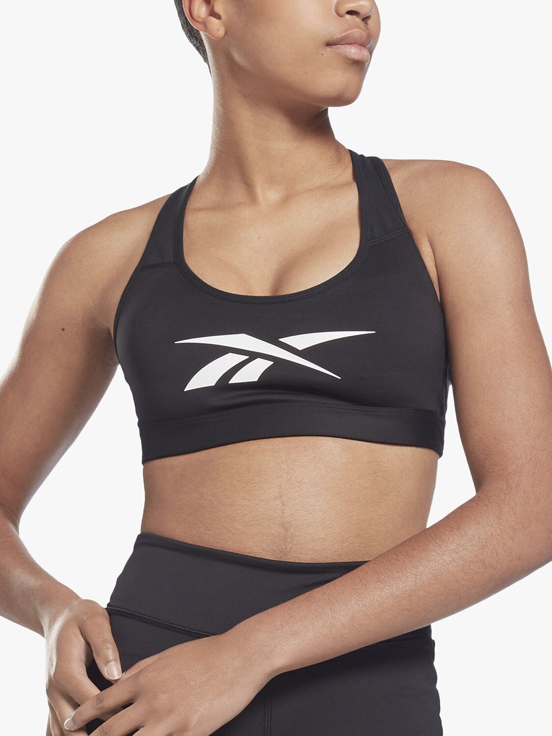Спортивный бюстгальтер средней ударной нагрузки Reebok Lux Vector Racer, черный
Спортивный бюстгальтер средней ударной нагрузки Reebok Lux Vector Racer, черный