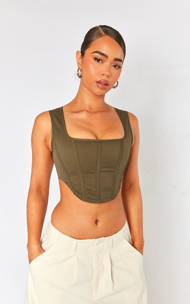 PrettyLittleThing Укороченный топ-корсет из эластичной тканой ткани темно-хаки с корсетом
PrettyLittleThing Укороченный топ-корсет из эластичной тканой ткани темно-хаки с корсетом