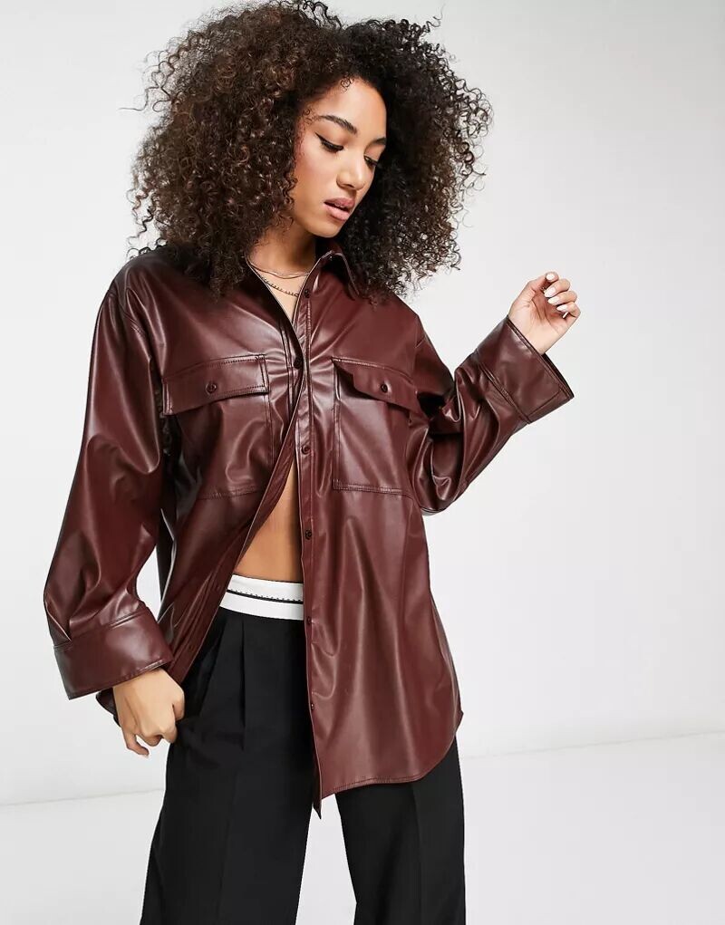 Шоколадная рубашка оверсайз из искусственной кожи с широкими манжетами ASOS
Шоколадная рубашка оверсайз из искусственной кожи с широкими манжетами ASOS