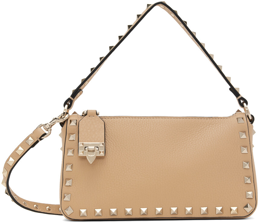 Маленькая бежевая сумка Rockstud из зернистой телячьей кожи Valentino Garavani
Маленькая бежевая сумка Rockstud из зернистой телячьей кожи Valentino Garavani