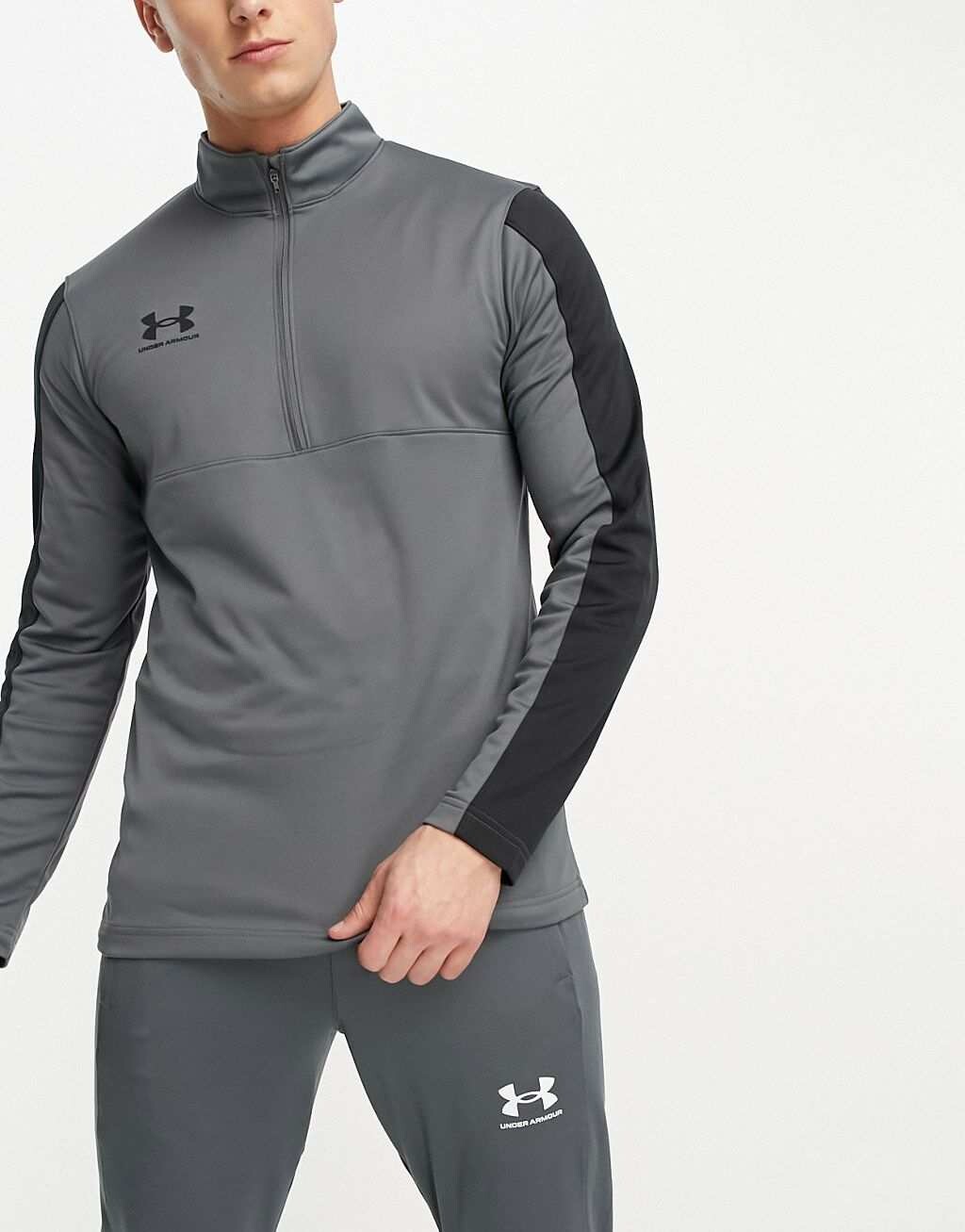 Серый топ среднего слоя с молнией 1/4 и длинными рукавами Under Armour Football Challenger
Серый топ среднего слоя с молнией 1/4 и длинными рукавами Under Armour Football Challenger