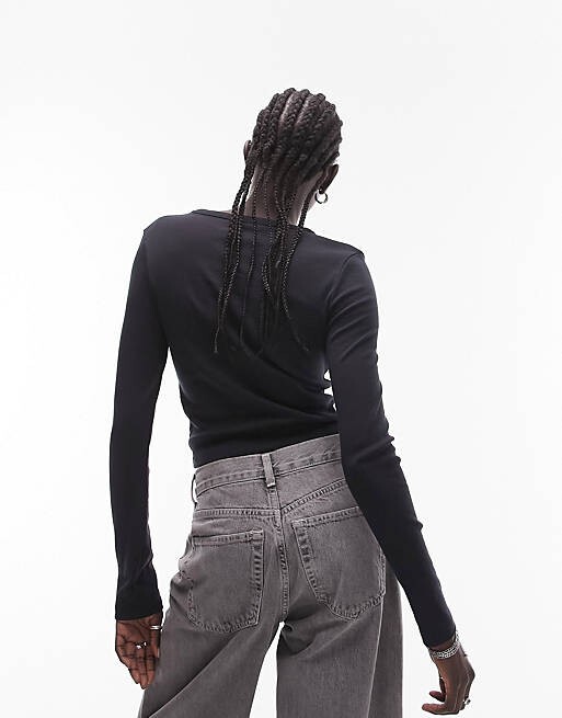 Черный повседневный топ с длинными рукавами Topshop
Черный повседневный топ с длинными рукавами Topshop
