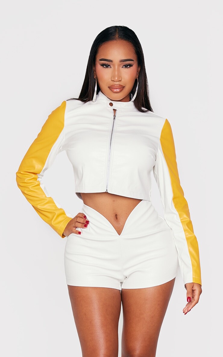 PrettyLittleThing Белая укороченная куртка на молнии из искусственной кожи с цветными блоками Shape, Белый
PrettyLittleThing Белая укороченная куртка на молнии из искусственной кожи с цветными блоками Shape, Белый