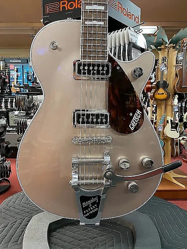 Gretsch G6128T Players Edition Jet DS с Bigsby, накладка на гриф из палисандра, цвет Sahara Metallic G6128T Players Edition Jet DS with Bigsby, Rosewood Fingerboard, Sahara Metallic
Gretsch G6128T Players Edition Jet DS с Bigsby, накладка на гриф из палисандра, цвет Sahara Metallic G6128T Players Edition Jet DS with Bigsby, Rosewood Fingerboard, Sahara Metallic