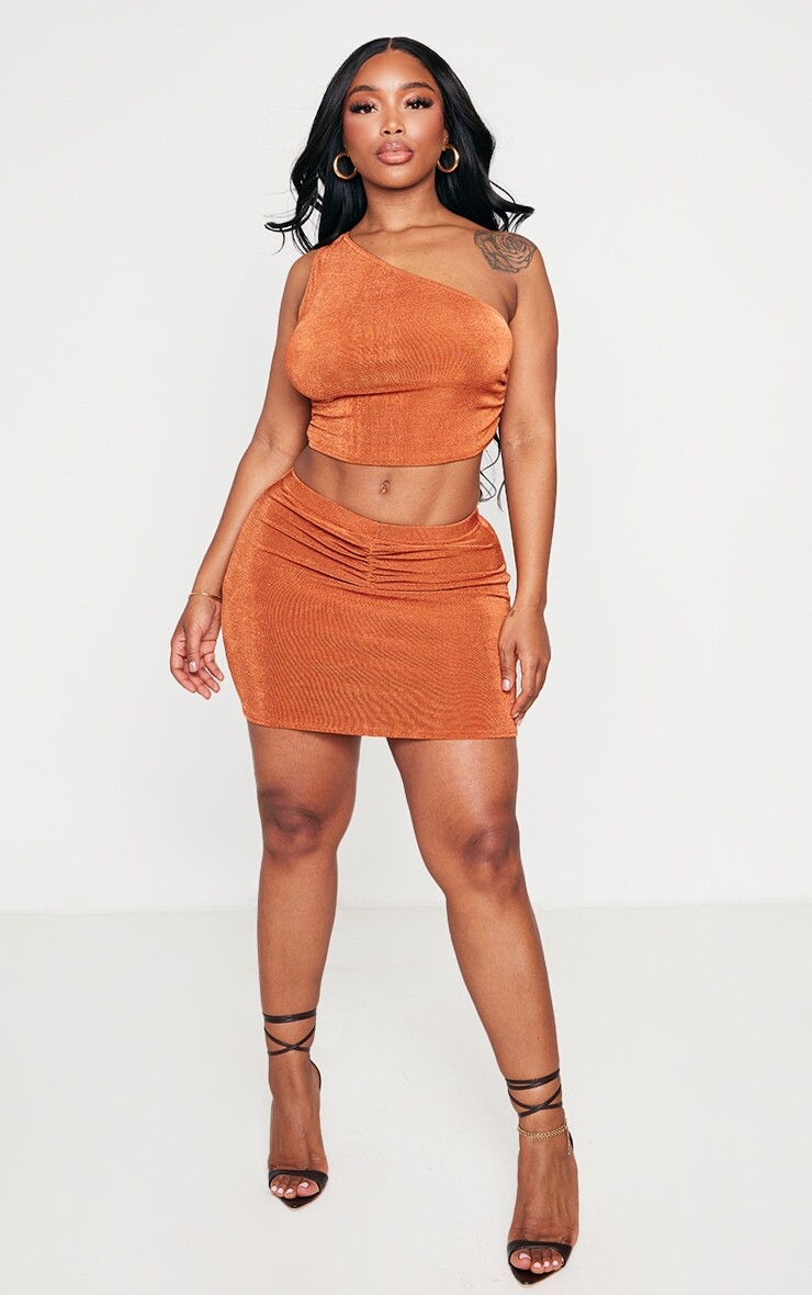 PrettyLittleThing Обтягивающая мини-юбка из ацетата цвета ржавчины со сборками спереди
PrettyLittleThing Обтягивающая мини-юбка из ацетата цвета ржавчины со сборками спереди