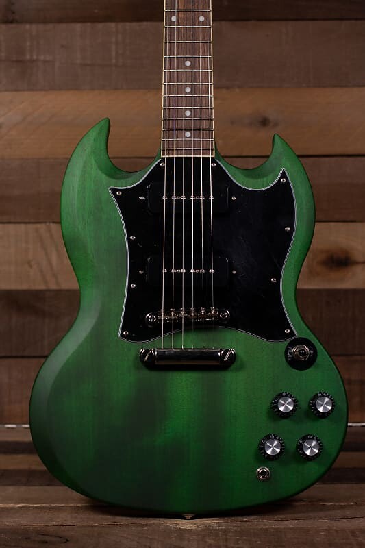Epiphone SG Classic, P-90s - поношенный зеленый цвет Инвернесс SG Classic, P-90s - Worn Inverness Green
Epiphone SG Classic, P-90s - поношенный зеленый цвет Инвернесс SG Classic, P-90s - Worn Inverness Green