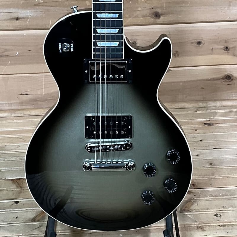 Gibson Adam Jones Les Paul Standard Электрогитара - Silverburst Adam Jones Les Paul Standard Electric Guitar - Silverburst
Gibson Adam Jones Les Paul Standard Электрогитара - Silverburst Adam Jones Les Paul Standard Electric Guitar - Silverburst