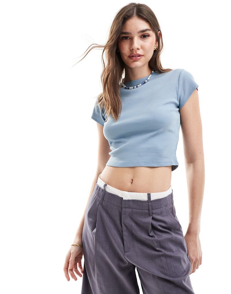 ASOS DESIGN – укороченный топ синего цвета в рубчик с короткими рукавами и эффектом стирки
ASOS DESIGN – укороченный топ синего цвета в рубчик с короткими рукавами и эффектом стирки