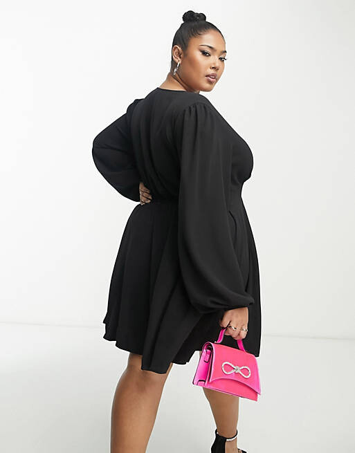 Черное чайное платье мини с длинными рукавами и завязками спереди ASOS DESIGN Curve
Черное чайное платье мини с длинными рукавами и завязками спереди ASOS DESIGN Curve