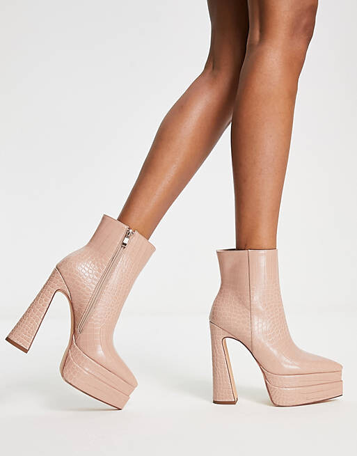 Бежевые ботинки под кожу крокодила Simmi London на двойной платформе
Бежевые ботинки под кожу крокодила Simmi London на двойной платформе