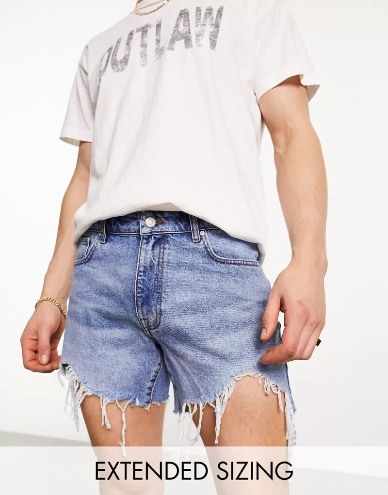 Светлые джинсовые шорты укороченной длины ASOS с рваными деталями и необработанным подолом
Светлые джинсовые шорты укороченной длины ASOS с рваными деталями и необработанным подолом
