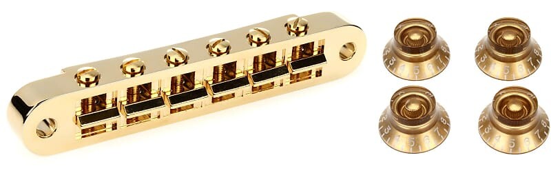 Аксессуары Gibson Nashville Tune-O-Matic Bridge w/Full Assembly — золотой комплект с аксессуарами Gibson Top Hat Knobs, 4 шт. — винтажное золото Gibson Accessories PBBR-040=1 PRHK-020=1
Аксессуары Gibson Nashville Tune-O-Matic Bridge w/Full Assembly — золотой комплект с аксессуарами Gibson Top Hat Knobs, 4 шт. — винтажное золото Gibson Accessories PBBR-040=1 PRHK-020=1