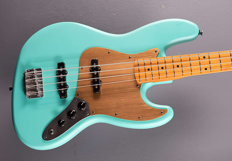 40th Anniversary Jazz Bass Vintage Edition - Satin Sea Foam Green Squier 40th Anniversary Jazz Bass Edition -
40th Anniversary Jazz Bass Vintage Edition - Satin Sea Foam Green Squier 40th Anniversary Jazz Bass Edition -