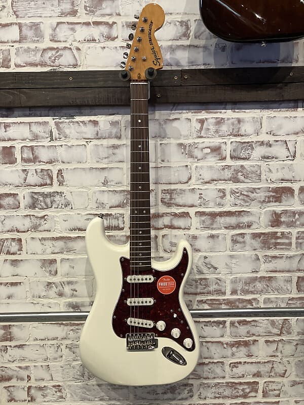 Электрогитара Squier Classic Vibe '70s Stratocaster with Maple Fretboard 2021 - Present - Vintage White
Электрогитара Squier Classic Vibe '70s Stratocaster with Maple Fretboard 2021 - Present - Vintage White