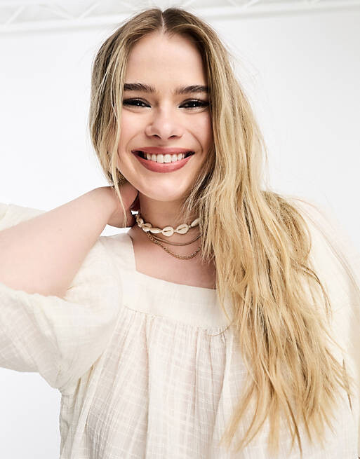 Белый топ из фактурного газа с квадратным вырезом и объемными рукавами ASOS DESIGN Curve
Белый топ из фактурного газа с квадратным вырезом и объемными рукавами ASOS DESIGN Curve