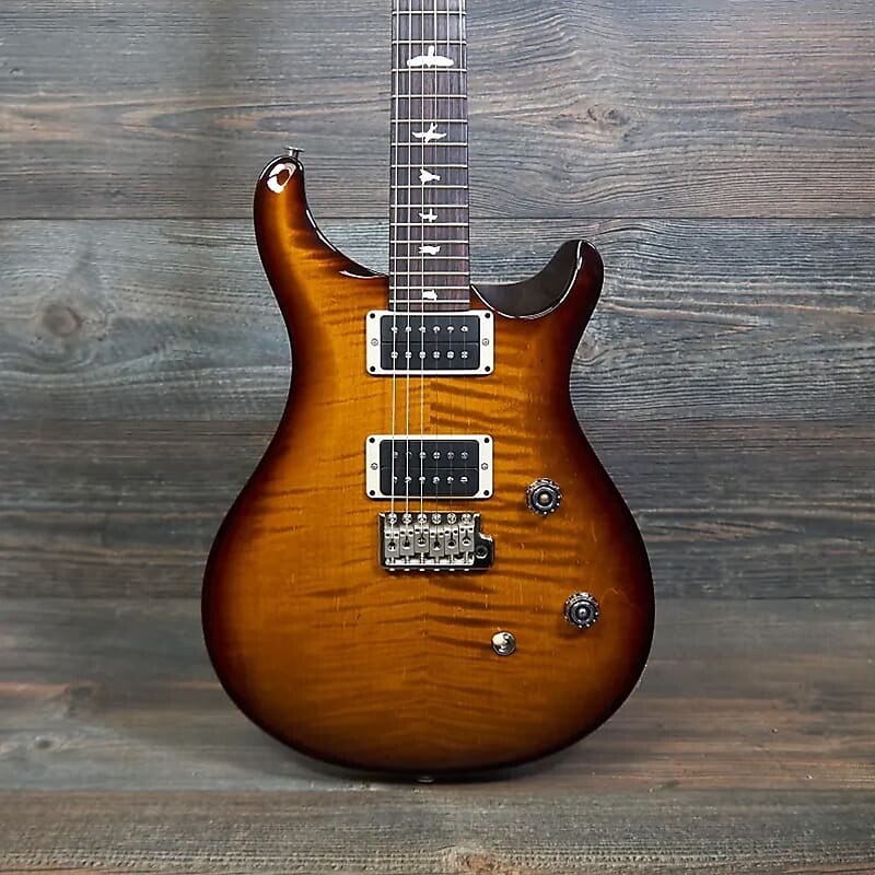 PRS CE 24 - Amber Smokeburst Wrap с черным атласным грифом и палисандровой накладкой 104143CCMC5
PRS CE 24 - Amber Smokeburst Wrap с черным атласным грифом и палисандровой накладкой 104143CCMC5