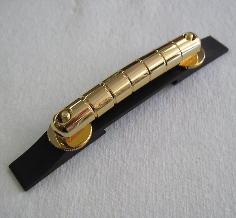 Мост Gretsch Gold Rocking Bar в сборе с основанием из черного дерева 0062845000 Gold Rocking Bar Bridge Assy with Ebony Base 006-2845-000
Мост Gretsch Gold Rocking Bar в сборе с основанием из черного дерева 0062845000 Gold Rocking Bar Bridge Assy with Ebony Base 006-2845-000