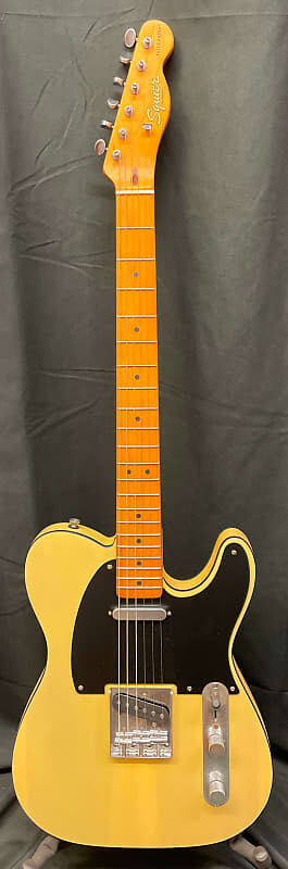 Squier 40th Anniversary Telecaster Vintage Edition Кленовая накладка на гриф Черная анодированная накладка Атласная винтажная светлая электрогитара
Squier 40th Anniversary Telecaster Vintage Edition Кленовая накладка на гриф Черная анодированная накладка Атласная винтажная светлая электрогитара