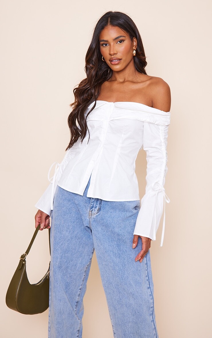 PrettyLittleThing Белая хлопковая блузка на пуговицах с открытыми рукавами и рюшами
PrettyLittleThing Белая хлопковая блузка на пуговицах с открытыми рукавами и рюшами