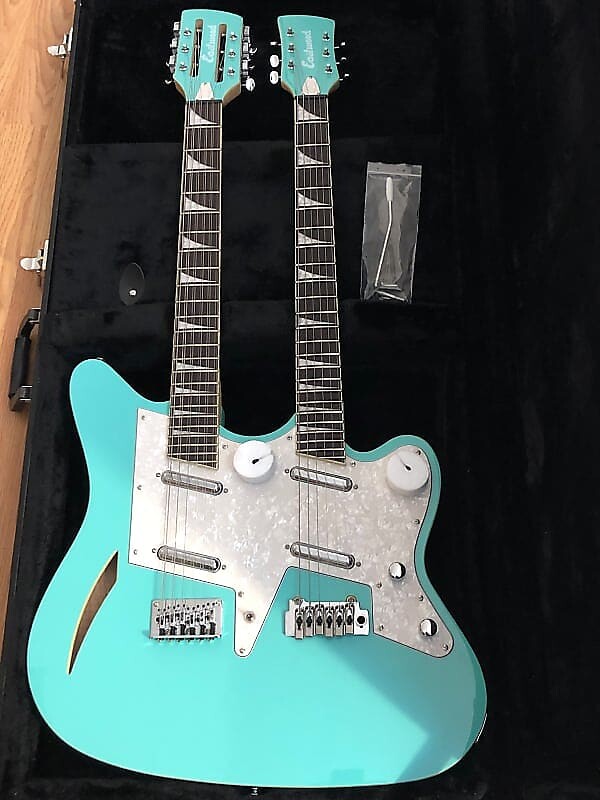 Электрогитара Eastwood SURFCASTER 12/6 Bound Tone-Chambered Mahogany Body Double Neck Electric Guitar w/Hard Case
Электрогитара Eastwood SURFCASTER 12/6 Bound Tone-Chambered Mahogany Body Double Neck Electric Guitar w/Hard Case