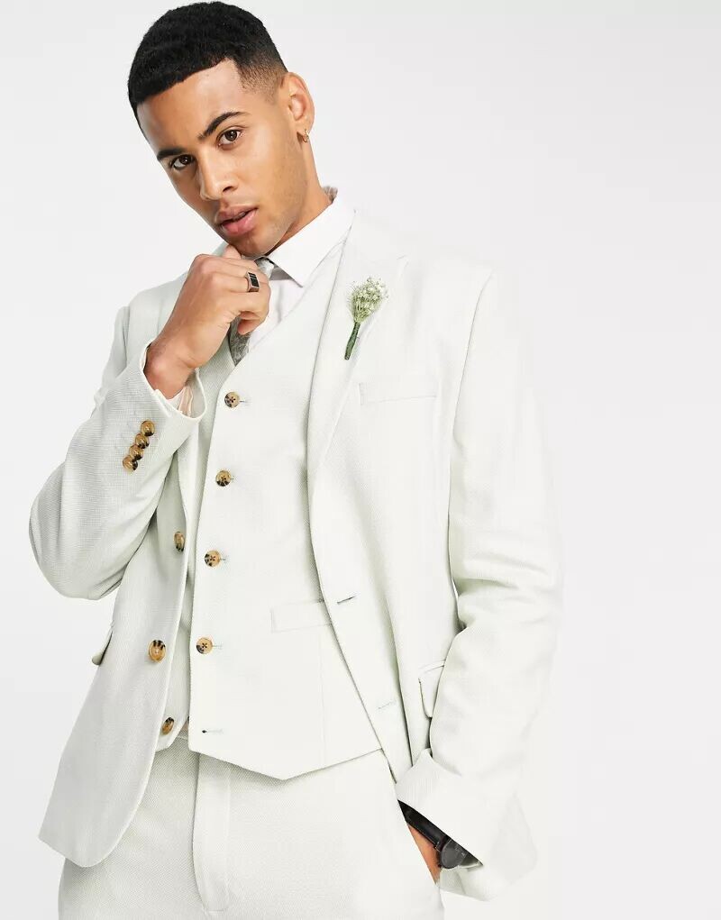 ASOS Wedding льняной пиджак пастельно-зеленого цвета, облегающий крой и очень тонкая структура
ASOS Wedding льняной пиджак пастельно-зеленого цвета, облегающий крой и очень тонкая структура