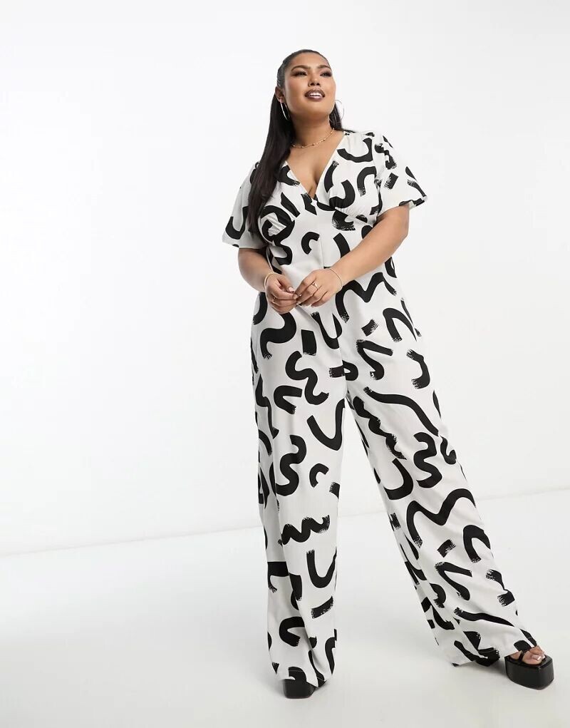 Черно-белый комбинезон широкого кроя Vero Moda Curve с абстрактным принтом
Черно-белый комбинезон широкого кроя Vero Moda Curve с абстрактным принтом