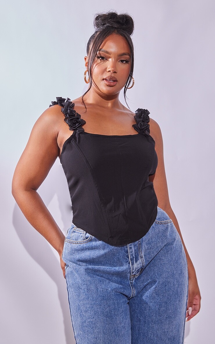 PrettyLittleThing Черный корсетный топ из эластичной ткани с цветочным узором Plus
PrettyLittleThing Черный корсетный топ из эластичной ткани с цветочным узором Plus