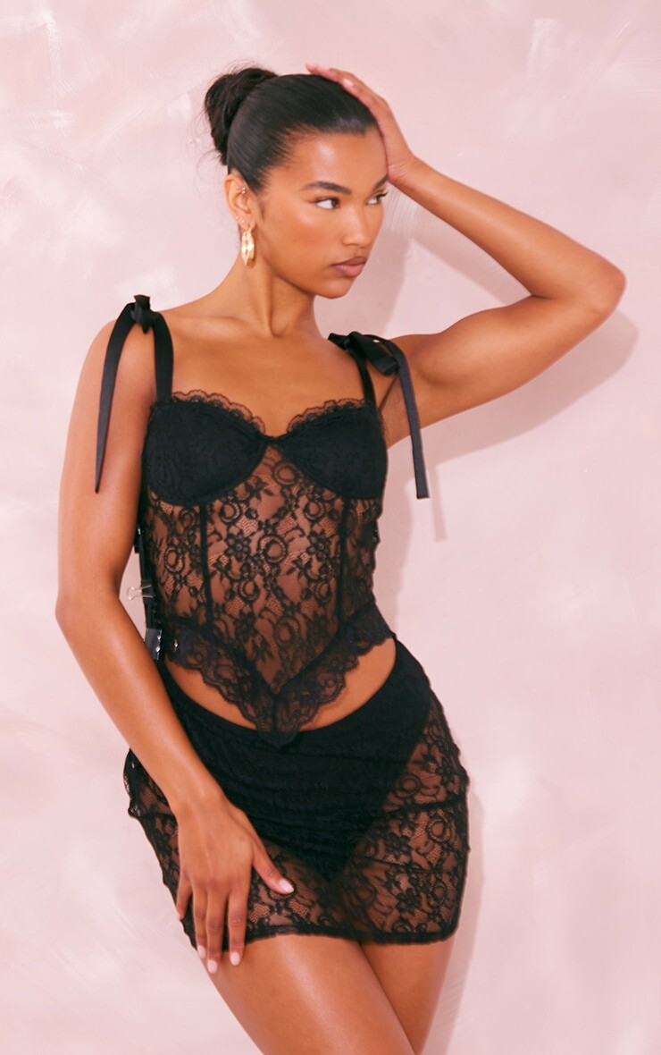 PrettyLittleThing Черное облегающее платье из прозрачного кружева с завязками на шнуровке
PrettyLittleThing Черное облегающее платье из прозрачного кружева с завязками на шнуровке