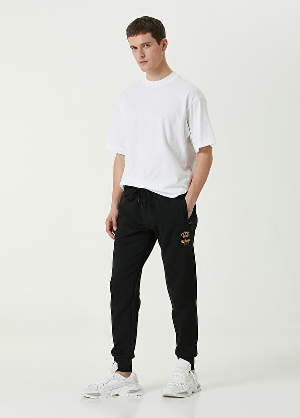 Черные спортивные штаны jogger с шнуровой нашивкой на талии Dolce&Gabbana, Черный
Черные спортивные штаны jogger с шнуровой нашивкой на талии Dolce&Gabbana, Черный