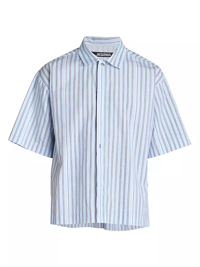 Хлопковая рубашка на пуговицах Manches Courte Jacquemus, цвет print beige stripes
Хлопковая рубашка на пуговицах Manches Courte Jacquemus, цвет print beige stripes