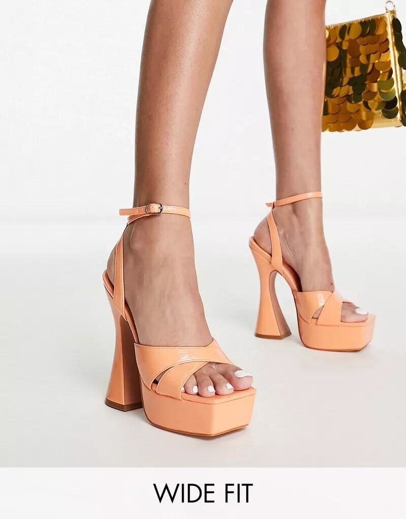 SIMMI London Wide Fit Лакированные туфли Oceani на платформе абрикосового цвета с расклешенным каблуком, широкая посадка Simmi Wide Fit
SIMMI London Wide Fit Лакированные туфли Oceani на платформе абрикосового цвета с расклешенным каблуком, широкая посадка Simmi Wide Fit