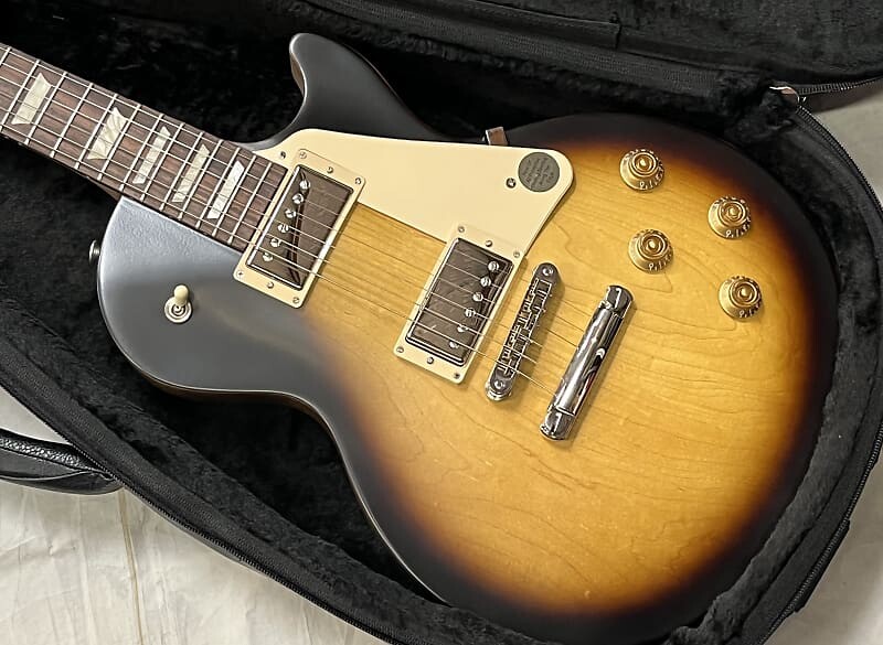 Электрогитара Gibson Les Paul Tribute 2021 Satin Tobacco Burst New Unplayed w/Bag Authorized Dealer 8lbs 6oz
Электрогитара Gibson Les Paul Tribute 2021 Satin Tobacco Burst New Unplayed w/Bag Authorized Dealer 8lbs 6oz