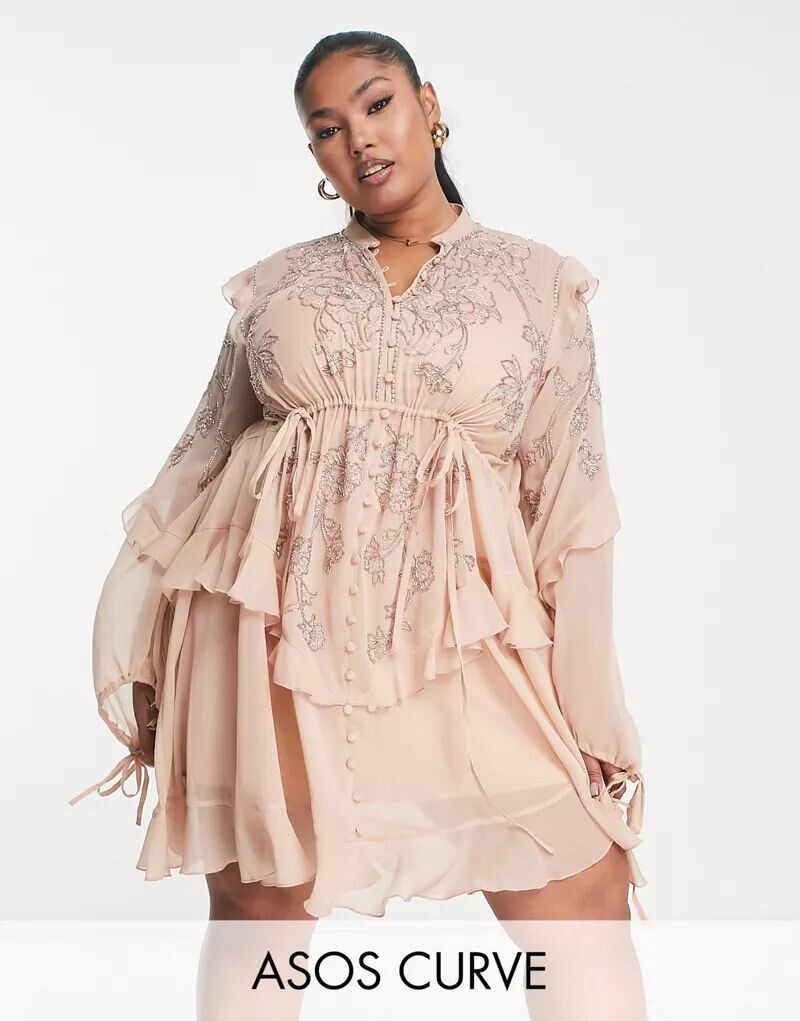 Пыльно-розовое мини-платье ASOS DESIGN Curve с цветочным декором, оборками и пуговицами спереди
Пыльно-розовое мини-платье ASOS DESIGN Curve с цветочным декором, оборками и пуговицами спереди