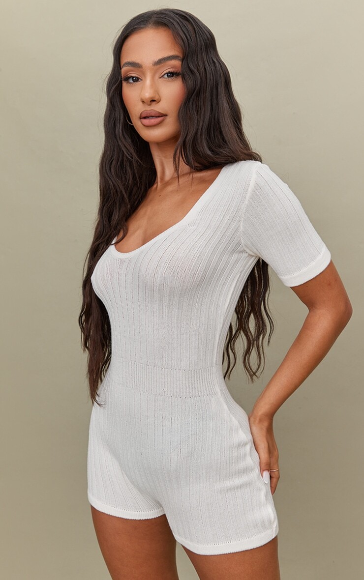 PrettyLittleThing Кремовый трикотажный комбинезон с короткими рукавами Petite
PrettyLittleThing Кремовый трикотажный комбинезон с короткими рукавами Petite