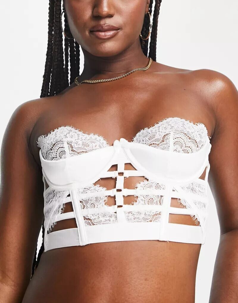 Корсетный бюстгальтер без подкладок Hunkemöller Seraphina с белым кружевом и длинными бретелями Hunkemoller
Корсетный бюстгальтер без подкладок Hunkemöller Seraphina с белым кружевом и длинными бретелями Hunkemoller