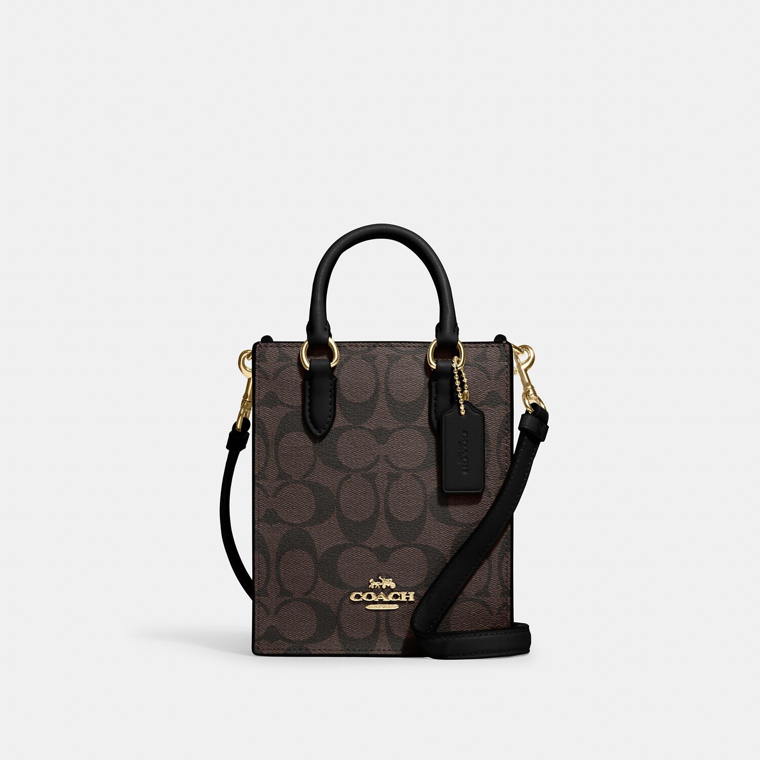 Миниатюрная сумка-тоут Coach Outlet North South из фирменной парусины, цвет Gold/Brown Black
Миниатюрная сумка-тоут Coach Outlet North South из фирменной парусины, цвет Gold/Brown Black