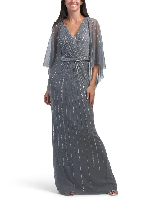 Платье с прозрачными рукавами и накидкой из бисера Terani Couture, цвет Dark Silver
Платье с прозрачными рукавами и накидкой из бисера Terani Couture, цвет Dark Silver